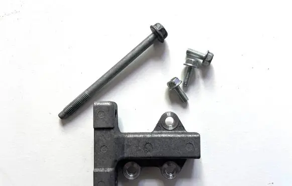 Nissan Leaf II (ZE1) A/C compressor mount bracket 