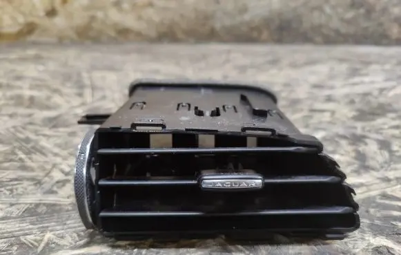 Jaguar XE Dash center air vent grill GX73014L21A