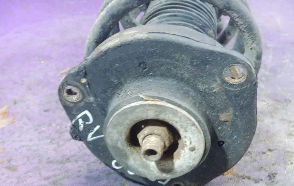 Front shock absorber with coil spring