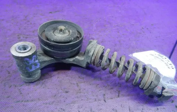 Opel Corsa D Timing belt tensioner 55565236AAAL