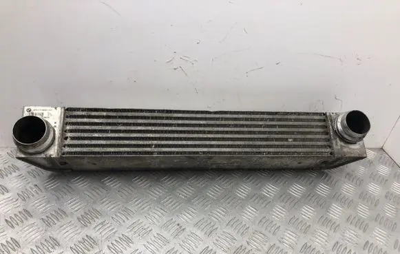BMW 5 E60 E61 Intercooler radiator 7795823 F6438000
