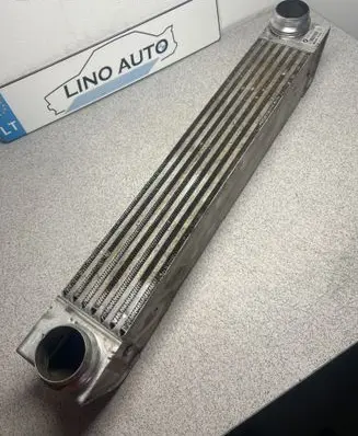 BMW 5 E60 E61 Intercooler radiator 7787446