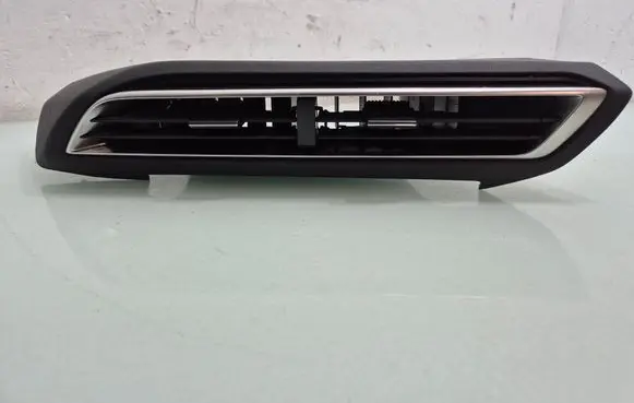 Dash center air vent grill