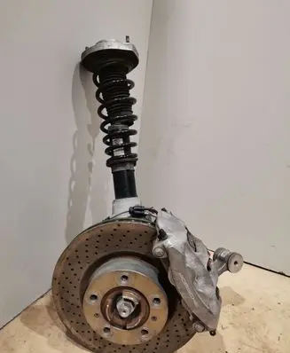 Front wheel hub spindle knuckle