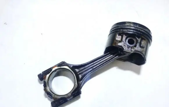 Piston with connecting rod