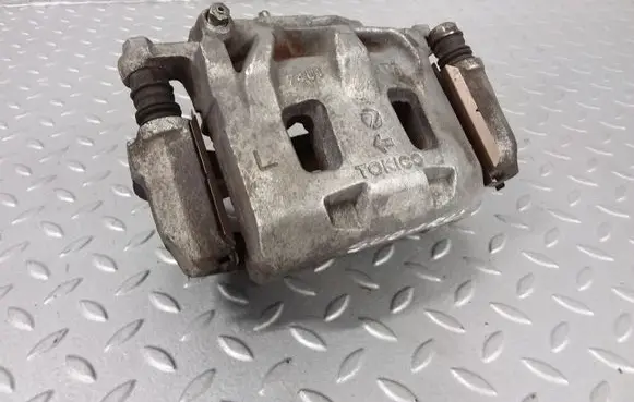 Subaru Outback (BS) Front brake caliper