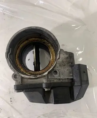 Volkswagen Golf V Throttle valve 03G128063A A2C53249824