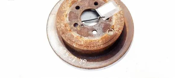 KIA Carens II Rear brake disc neventiliuojamas