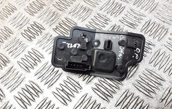 Tail light bulb cover holder