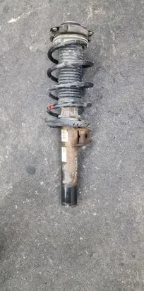 Volkswagen Caddy Front shock absorber/damper