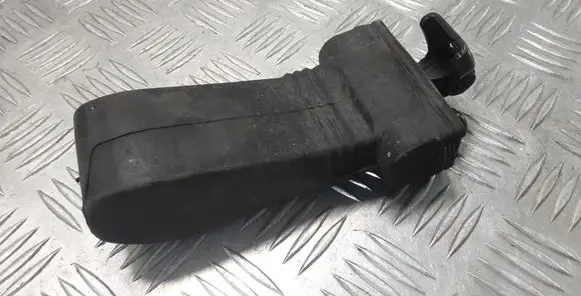 Front door check strap stopper