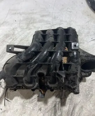 Volkswagen Polo III 6N 6N2 6NF Intake manifold 036129711