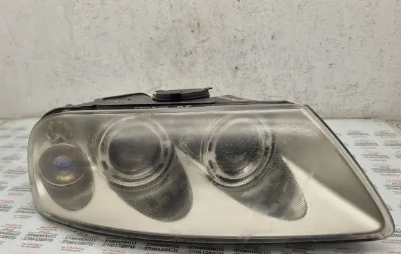Volkswagen Touareg I Headlight/headlamp 7L6941016BK