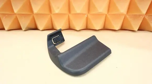 Front driver seat rail trim