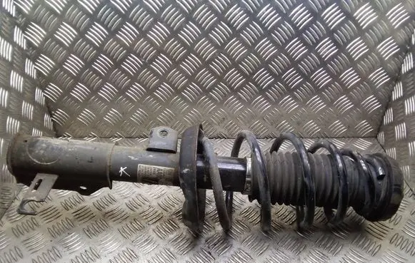 Opel Astra J Front shock absorber with coil spring 13354029