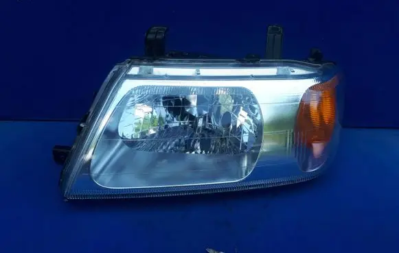 Mitsubishi Pajero Sport I Headlight/headlamp 10087416L