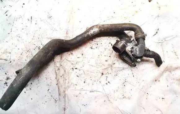 Volkswagen PASSAT B5 Engine coolant pipe/hose 071121121 071121133
