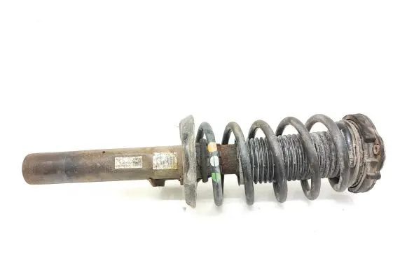 Volkswagen Caddy Front shock absorber with coil spring 1T0413031HQ