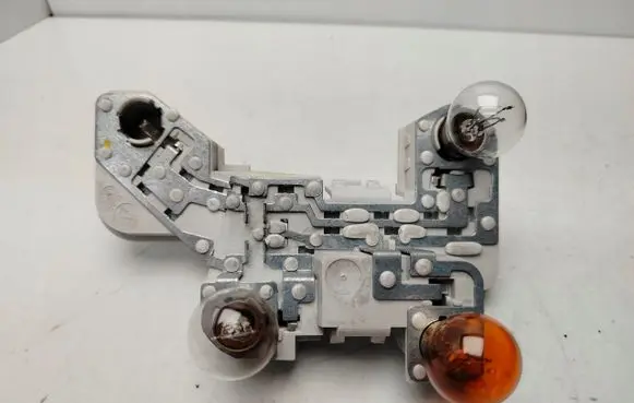 Volvo V50 Tail light bulb cover holder 271621