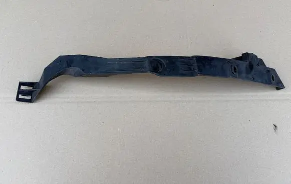 Opel Astra J Headlight/headlamp mounting bracket 13287640
