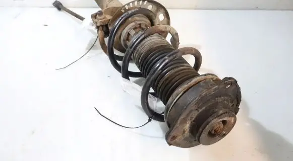 Volkswagen Golf V Front shock absorber with coil spring