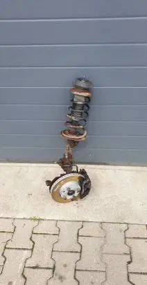 Suzuki Swift I Front wheel hub spindle knuckle