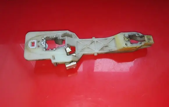 Rear door exterior handle/bracket