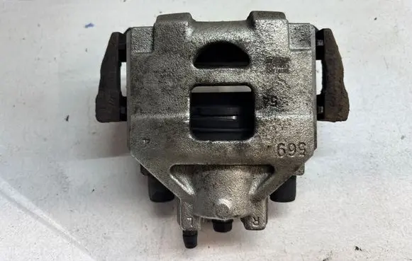 Toyota Yaris Front brake caliper 569