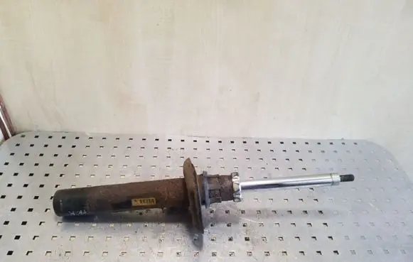 Volkswagen Caddy Front shock absorber/damper 1T0413031GB
