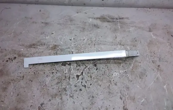 Rear bumper trim bar molding
