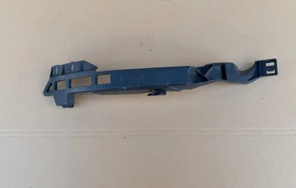 Opel Astra J Headlight/headlamp mounting bracket 13347148