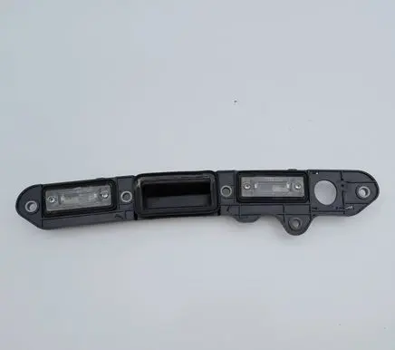 Volkswagen Golf Plus Trunk door license plate light bar 1T0827574J