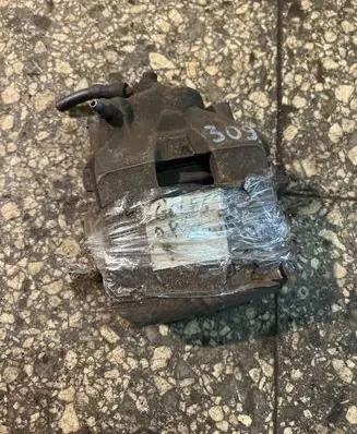 Volkswagen Golf V Front brake caliper