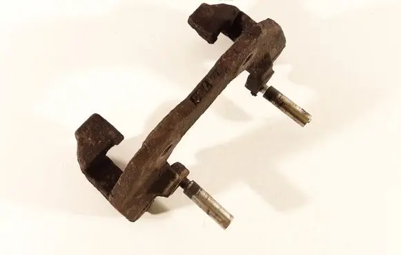 Mazda 3 I Front Brake Caliper Pad/Carrier 