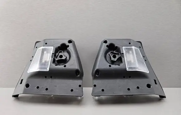 Tail light bulb cover holder