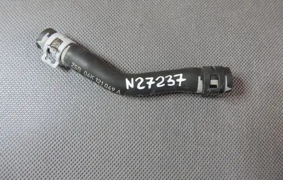 Volkswagen PASSAT B8 Engine coolant pipe/hose 06K121049A