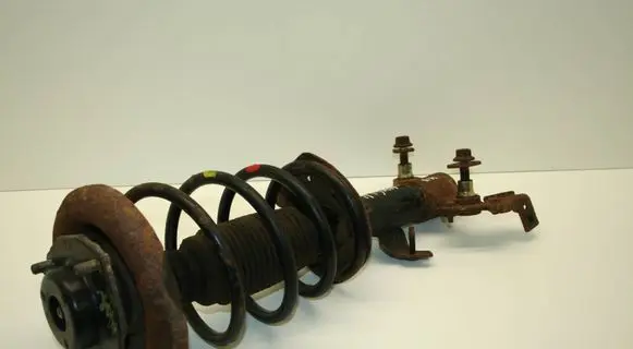 Nissan Primera Front shock absorber with coil spring