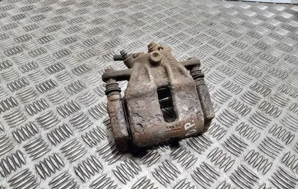 Nissan Note (E11) Front brake caliper