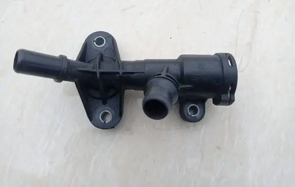 Thermostat/thermostat housing