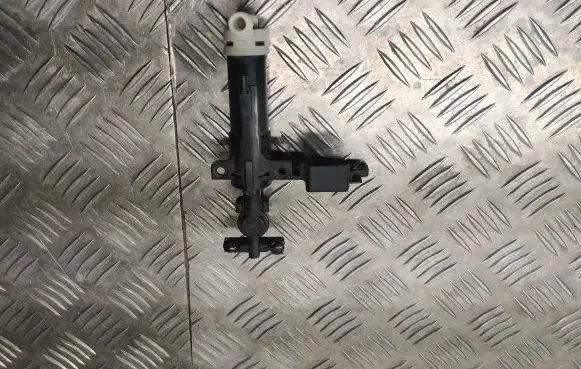Headlight washer spray nozzle