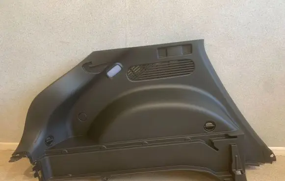 Trunk/boot side trim panel