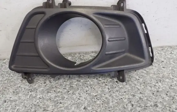 KIA Carens II Front fog light trim/grill
