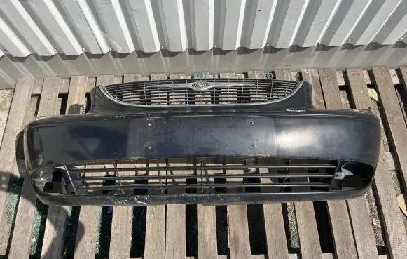 Chrysler Grand Voyager IV Front bumper 04857388