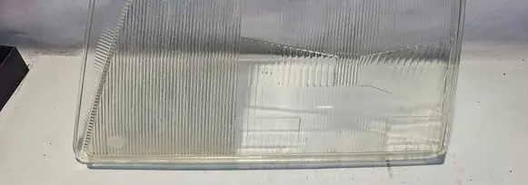 Mercedes-Benz E W124 Headlight lense 002144767 HELLA