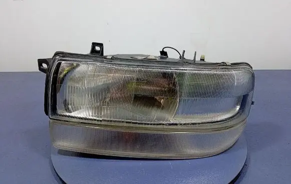 Opel Movano A Headlight/headlamp 7700352103