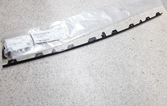 Rear bumper trim bar molding