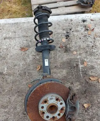 Volkswagen Golf VI Front shock absorber with coil spring 1T0413031HM
