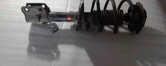 Nissan Leaf II (ZE1) Front shock absorber/damper