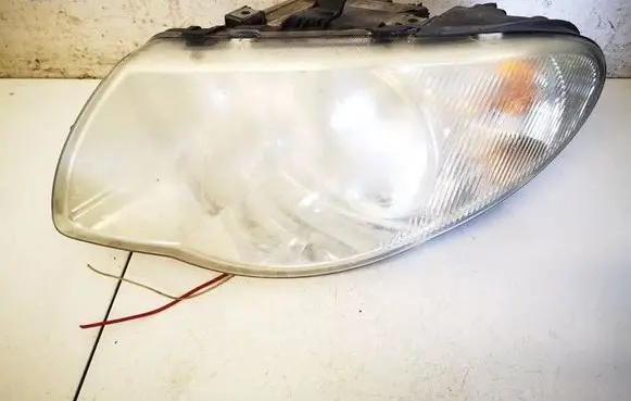 Chrysler Voyager Headlight/headlamp 04857831AC