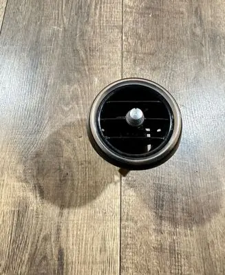 Dash center air vent grill